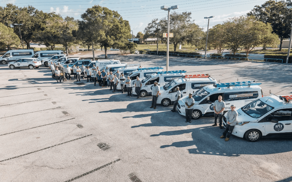 Apex Plumbing Group Photo With Trucks