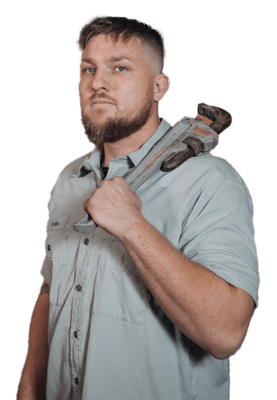 Plumber Holding Plumbing Wrench